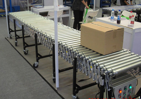 伸縮輥筒輸送機(jī)運(yùn)行圖，m.vdecode.com.cn